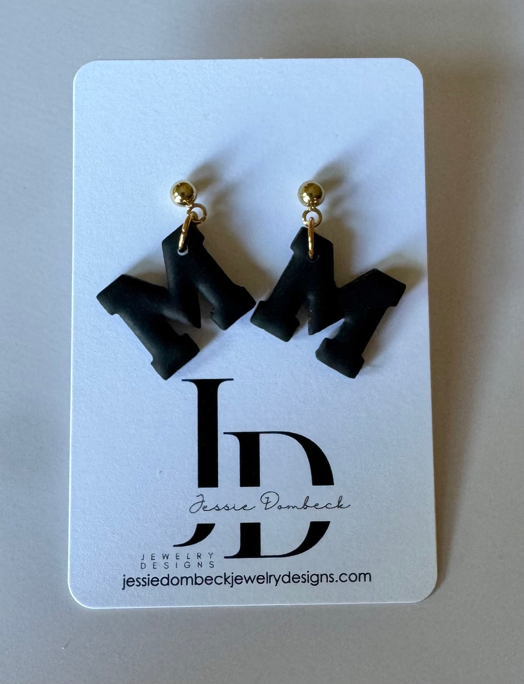 Black “M” Dangles